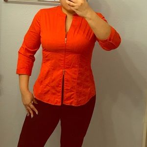 Orange zip up shirt